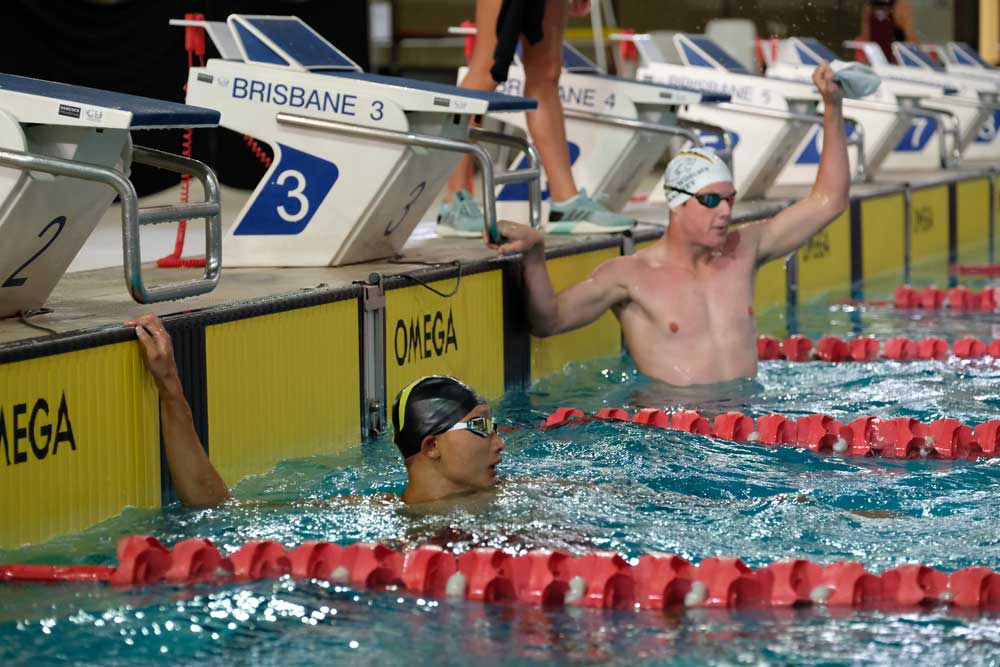 Rhys Lanskey celebrates swim win