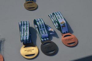 Medals for the 2021 Triathle and LaserRun